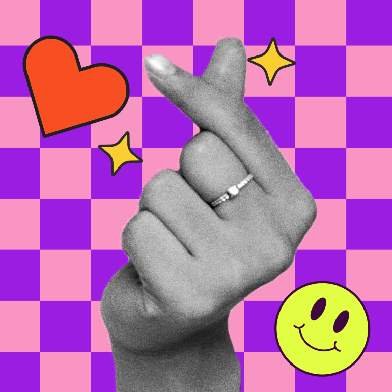 Hand making finger heart sign for K-Plus