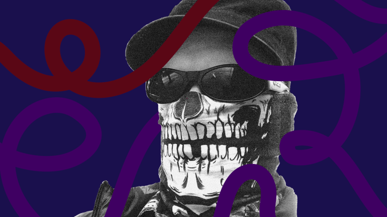 DJ Paradigm Lost headshot, wearing baseball cap, sunglasses, and skull mask