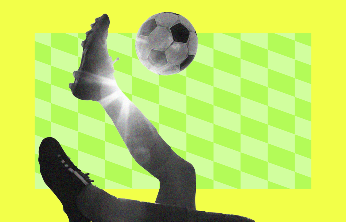 A person kicks a soccer ball in mid-air against a background with a yellow and green checkered pattern.